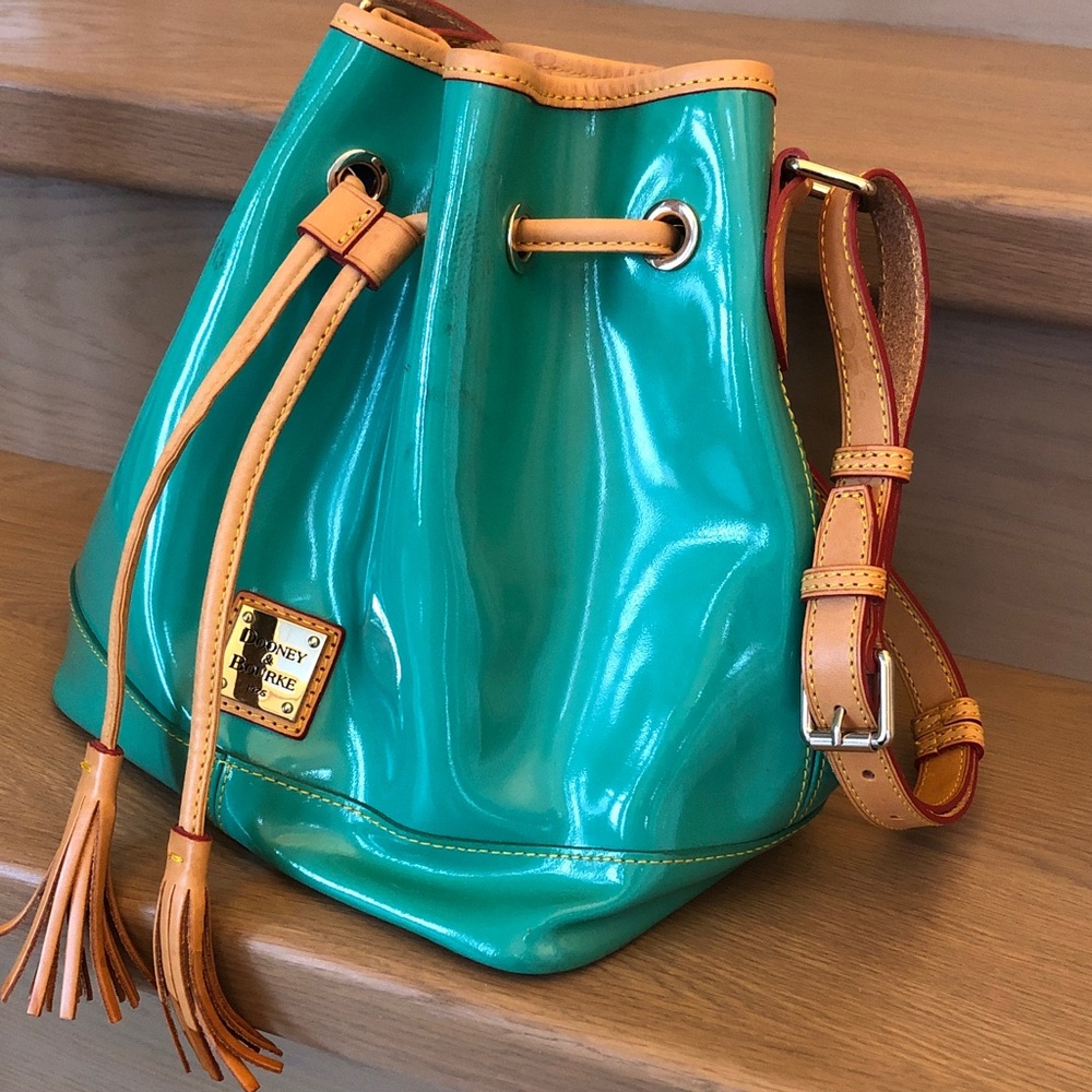 Dooney & Bourke Teal Patent Leather Drawstring Bucket Bag with Tan Trim - Picture 1 of 16